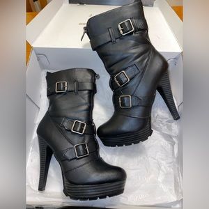 Ankle heeled boots with treaded bottom. Just fab Gemma